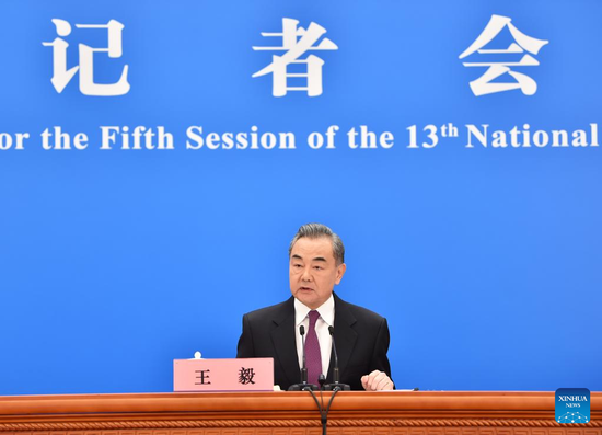 Highlights: Chinese FM meets press on foreign policy, relations
